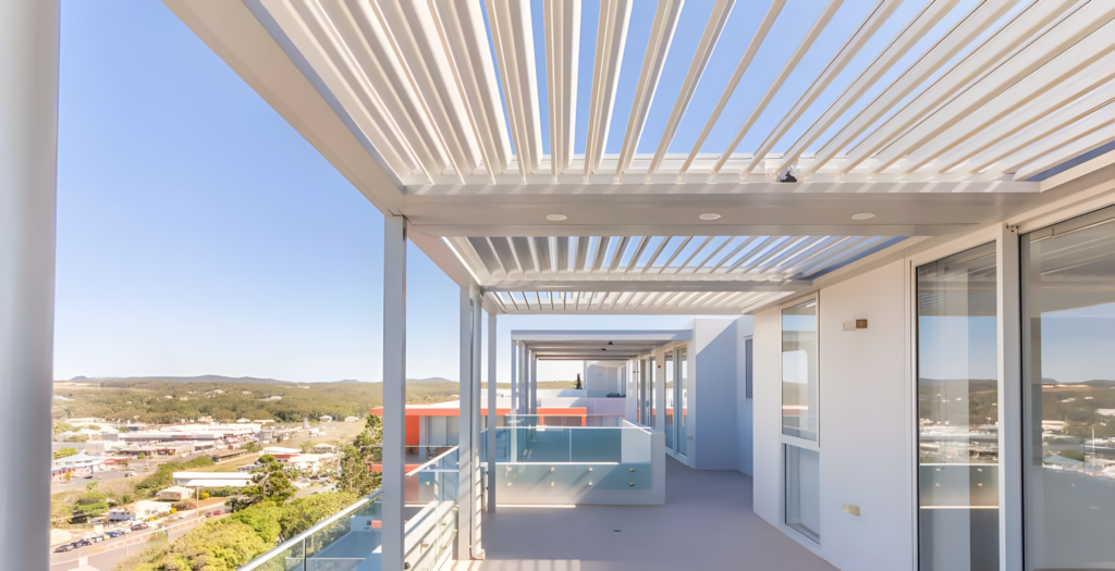 Modern balcony with pergola structure.